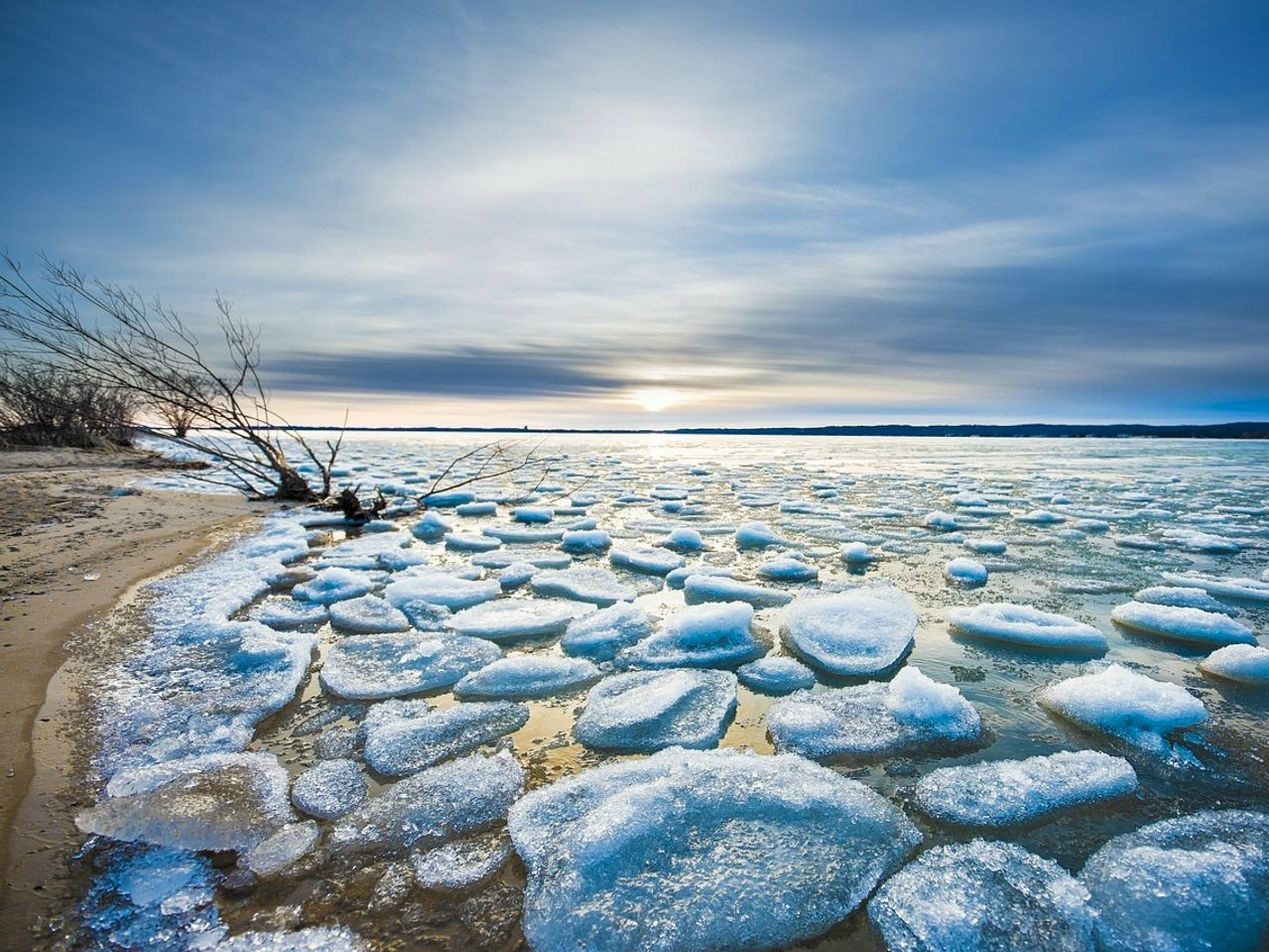 Mountain lake in winter, ice fishing season